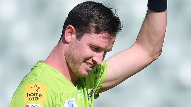 ADELAIDE, AUSTRALIA - JANUARY 24:Adam Milne of the Thunder askes for help after hurting his finger running out Travis Head  of the Strikers off the bowlers hand  during the Big Bash League match between the Sydney Thunder and the Adelaide Strikers at Adelaide Oval, on January 24, 2021, in Adelaide, Australia. (Photo by Mark Brake/Getty Images)