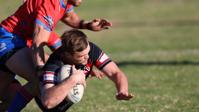 Sam McCann scores a try for Collegians against Western Suburbs Devils. Picture: Steve Montgomery