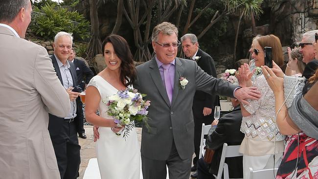 In happier times: Recently retired radio personality Richard Fowler, who was caught up in a flight cancellation and resulting long bus ride to Brisbane International Airport, was happier earlier this year when he wed Sherie Malcolm at The Surfers Paradise Marriott. Picture: Glenn Hampson