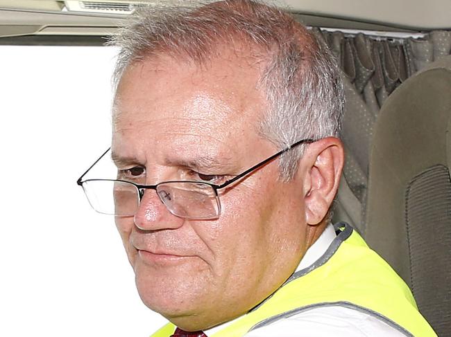 BRISBANE, AUSTRALIA - NewsWire Photos DECEMBER 20, 2021: Prime Minister Scott Morrison sits in a truck during a visit to John West Logistics in Brisbane. Picture: NCA NewsWire/Tertius Pickard