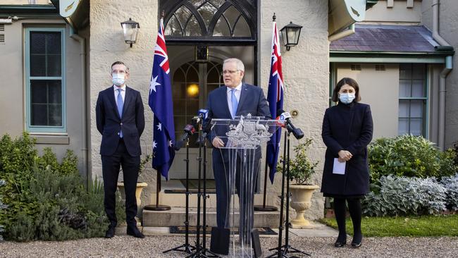 NSW Treasurer Dominic Perrottet, left, Prime Minister Scott Morrison and Premier Gladys Berejiklian at Kirribilli House in Sydney on Tuesday. Picture: Getty Images