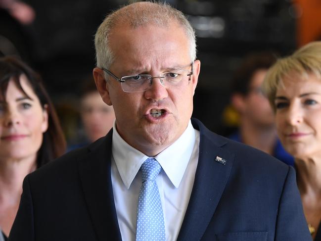 Australian Prime Minister Scott Morrison, joined by Small Business Minister Michaelia Cash, Member for Robertson Lucy Wicks and Liberal candidate for Dobell Jilly Pilon, speaks to the media during a visit to Central Coast Motor Group in Gosford, Tuesday, April 9, 2019. (AAP Image/Joel Carrett) NO ARCHIVING