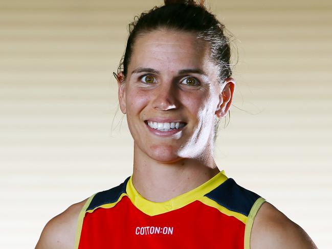 Adelaide Crows AFLW 'Captain Courageous' Chelsea Randall, with a detail of her tattoo 'Make it happen' on her lower left arm. (AAP/Emma Brasier)