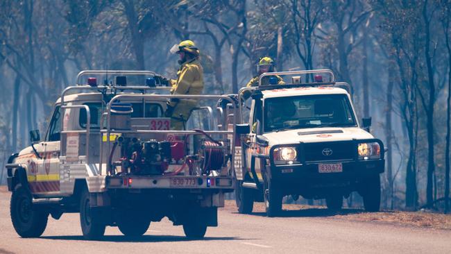 Another day of extreme fire conditions has seen numerous fires burn across Darwin's rural area. A Gunn Point Road fire was brought under control by several fire crews working in windy conditions. Picture: Che Chorley