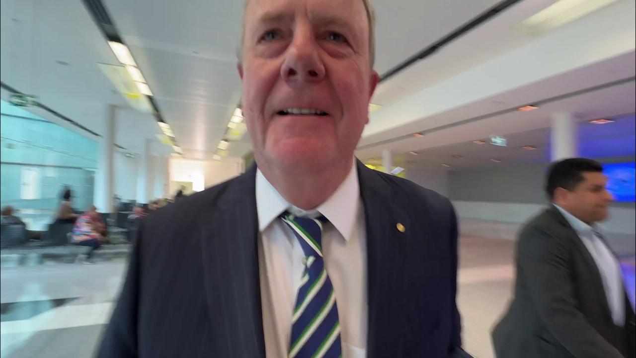 Stills taken from vision of reporter for The Australian, Liam Mendes approaching Nine chairman Peter Costello at Canberra airport. Costello shoulder barges Mendes where he subsequently falls to the ground. Picture: Liam Mendes.