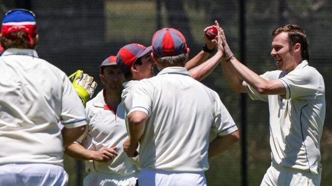 Michael Does gives a high five to his brother Anthony (right). Picture: Al Dillon