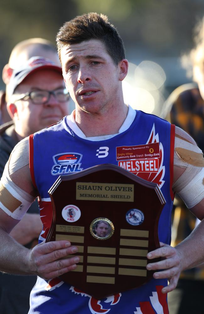 Burra captain Michael Downie with the Shaun Oliver Memorial Shield.