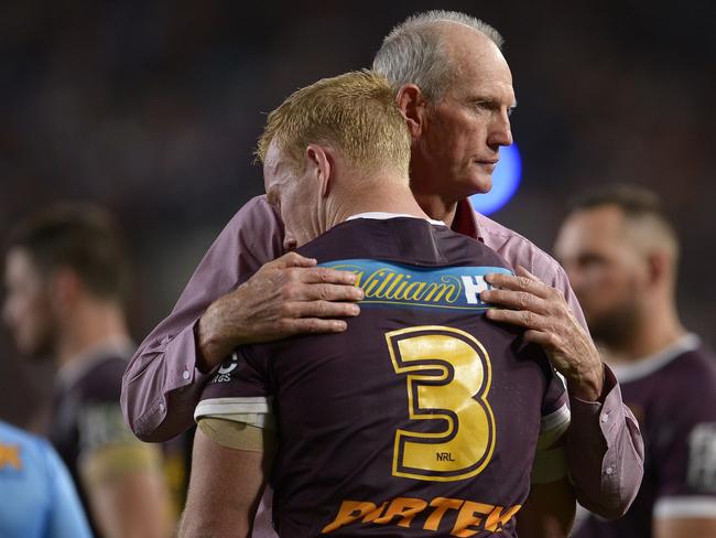 Wayne Bennett consoles Jack Reed following their 2015 grand final defeat. Picture: Brett Hemmings/Getty Images