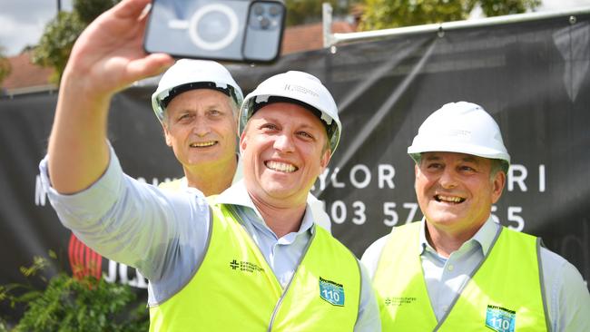 Scott Hutchinson, Deputy Premier Steven Miles and Don O'Rorke at the Yeerongpilly Green sod turning last year. Picture: NCA NewsWire / Dan Peled