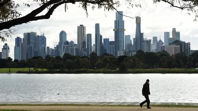 A man’s body was found in the water at Albert Park lake on Sunday morning. Picture: Andrew Henshaw