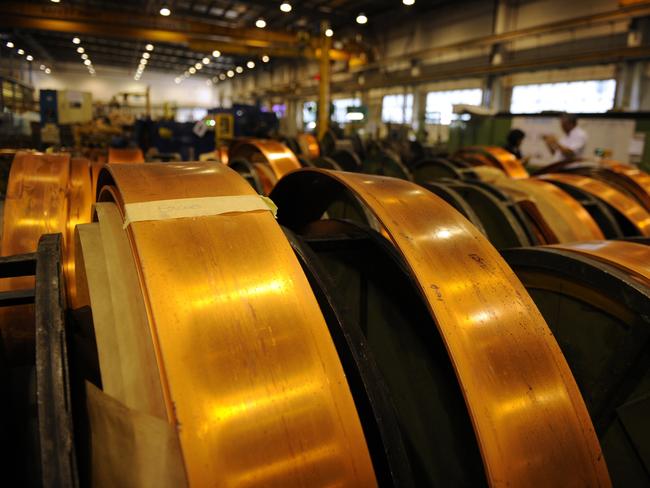 Rolls of ___ copper, which is used to make copper busbars in electrical systems (?), in the Luvata plant in Johor, Malaysia, on Monday, May 13, 2013. Photographer: Munshi Ahmed/Bloomberg