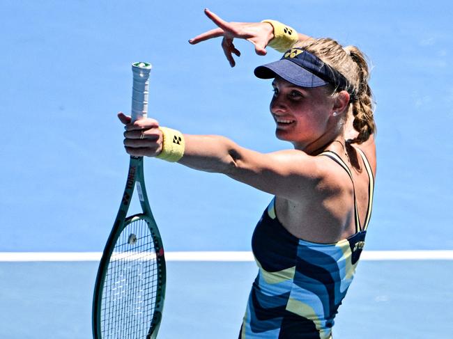 Ukraine's Dayana Yastremska celebrates after victory against Czech Republic's Linda Noskova in their women's singles quarter-final match on day 11 of the Australian Open tennis tournament in Melbourne on January 24, 2024. (Photo by Anthony WALLACE / AFP) / -- IMAGE RESTRICTED TO EDITORIAL USE - STRICTLY NO COMMERCIAL USE --