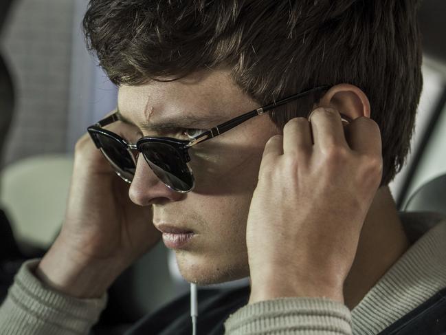 This image released by Sony Pictures shows Ansel Elgort, right, and Jamie Foxx in a scene from "Baby Driver." (Wilson Webb/Sony/TriStar Pictures via AP)