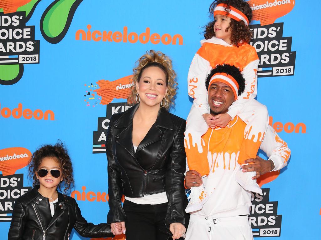 Cannon with his ex-wife, Mariah Carey, and their two children in 2018. Picture: AFP Photo/Jean-Baptiste Lacroix