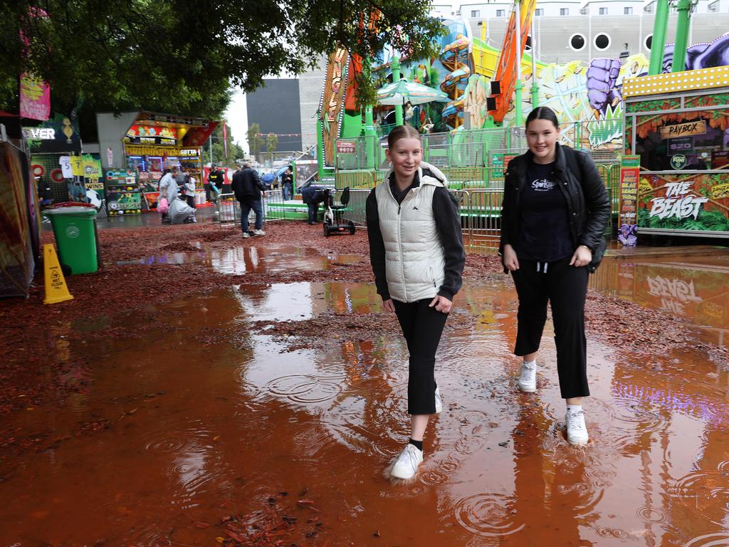 A soaked Sideshow Alley at People’ Day at the Ekka. Picture: Liam Kidston