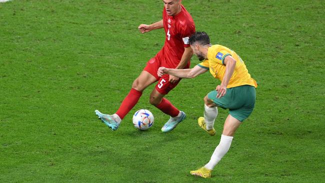 Mathew Leckie shoots to score for Australia against Denmark. Picture: AFP