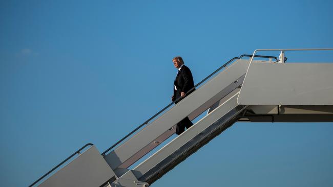 US President Donald Trump arrives at Andrews air force Base yesterday. (Picture: AFP/Brendan Smialowski).