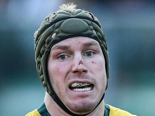 (FILES) In this file photo taken on November 17, 2018 Australia's number eight David  Pocock runs with the ball during the international rugby union test match between Italy and Australia at the Euganeo stadium in Padua. (Photo by Miguel MEDINA / AFP)