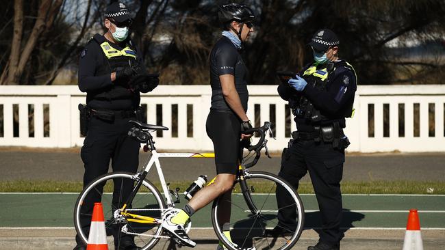 Police check licenses of cyclists along St Kilda Beach in Melbourne, Victoria. Picture: NCA NewsWire / Daniel Pockett