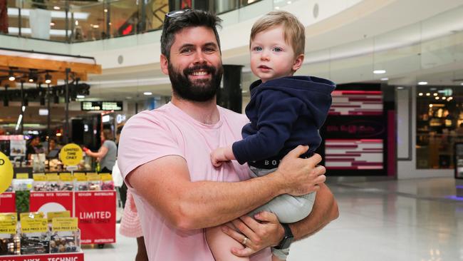 Father Michael Jones and baby Vincent Jones shares his opinion on why their local area of Blacktown in Sydney's West, voted on the Voice. Photo: Gaye Gerard