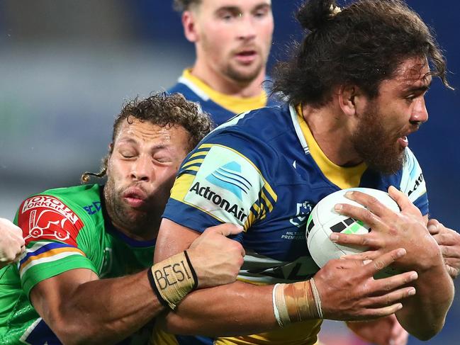 GOLD COAST, AUSTRALIA - JULY 22: Isaiah Papali'i of the Eels runs the ball during the round 19 NRL match between the Parramatta Eels and the Canberra Raiders at Cbus Super Stadium, on July 22, 2021, in Gold Coast, Australia. (Photo by Chris Hyde/Getty Images)