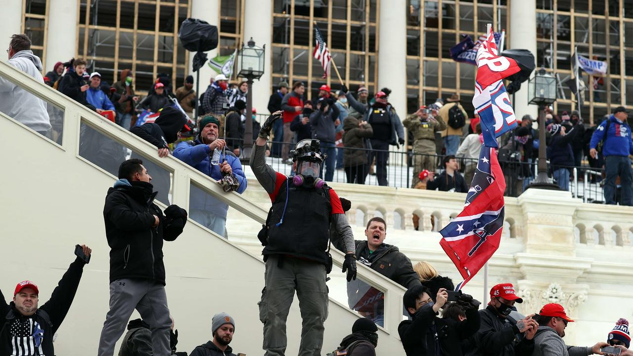 Donald Trump urged supporters to ‘go home’ – but also told them he loved them. Picture: Tasos Katopodis/Getty Images/AFP