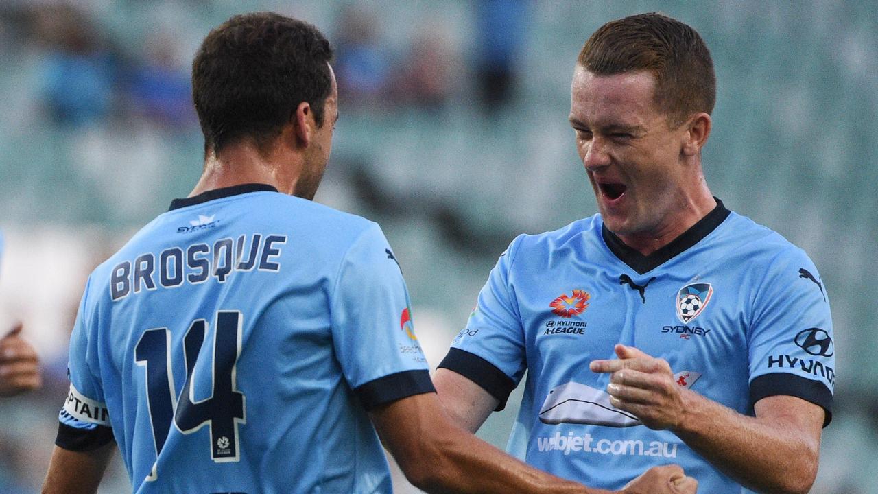 Sydney's captain Alex Brosque (14) celebrates with team mates after scoring a goal during the round 12 A-League match between Sydney FC and the Central Coast Mariners at Allianz Stadium in Sydney, on Saturday Dec. 26, 2015. (AAP Image/Mick Tsikas) NO ARCHIVING, EDITORIAL USE ONLY
