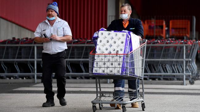 A man pushes a trolley with his shopping at a wholesale supermarket in Melbourne on Thursday. Picture: AFP