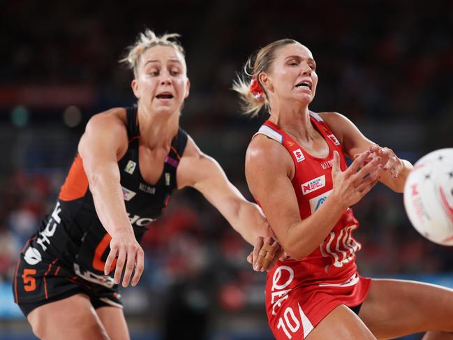 Lili Gorman-Brown of the Swifts is challenged by Jamie-Lee Price. Picture: Getty Images)