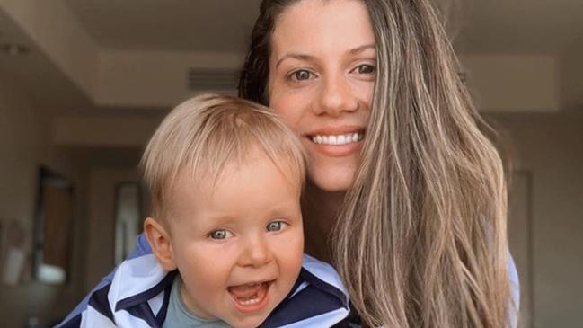 Jordan Ablett, wife of Gary Ablett, with son Levi.