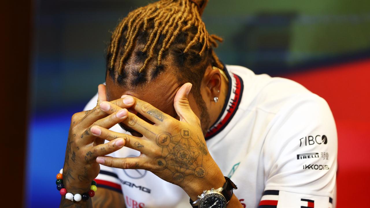 BAKU, AZERBAIJAN - JUNE 10: Lewis Hamilton of Great Britain and Mercedes reacts in the Drivers Press Conference prior to practice ahead of the F1 Grand Prix of Azerbaijan at Baku City Circuit on June 10, 2022 in Baku, Azerbaijan. (Photo by Clive Rose/Getty Images)