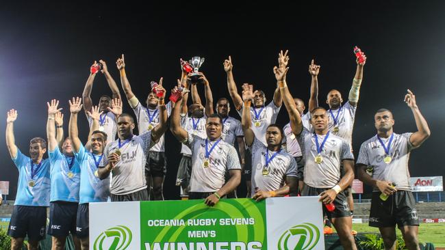 Fiji celebrate the men's title. Photo: Oceania Rugby