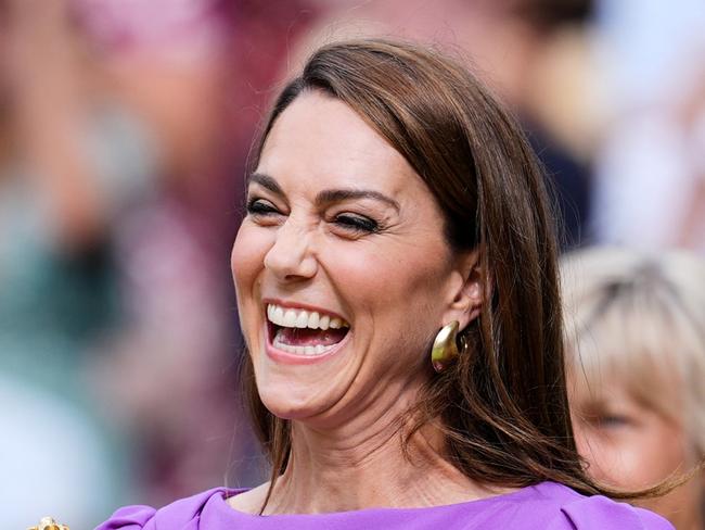 LONDON, ENGLAND - JULY 14: Catherine, Princess of Wales smiles during day fourteen of The Championships Wimbledon 2024 at All England Lawn Tennis and Croquet Club on July 14, 2024 in London, England. (Photo by Shi Tang/Getty Images)