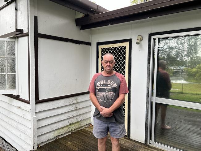 Greg Conroy at the Southport home he and his family were given just hours to leave. Picture: Keith Woods.