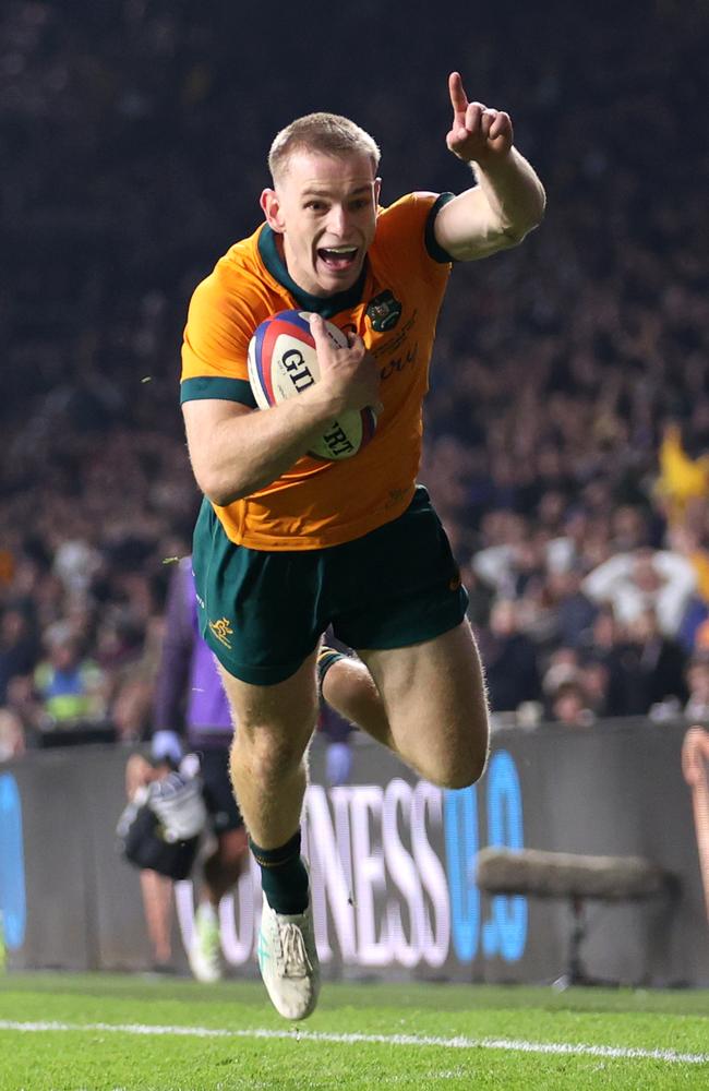 Max Jorgensen of Australia celebrates as he scores his team's fifth and winning try. (Photo by Julian Finney/Getty Images)