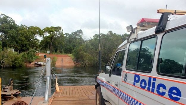 Local police on the ferry at the Jardine River crossing. Picture: Supplied