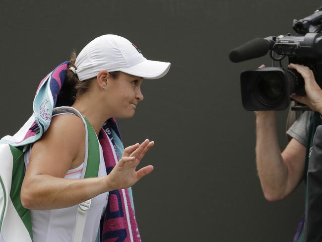 Australia's Ashleigh Barty waves goodbye to the Wimbledon crowd.