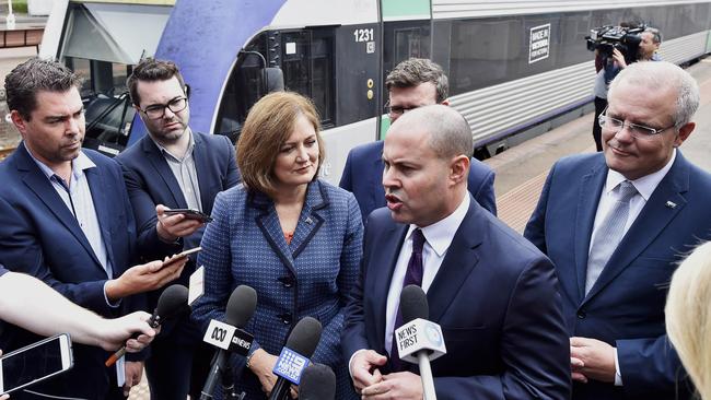 Josh Frydenberg addresses the media with Prime Minister Scott Morrison at Geelong train station. Picture: Alan Barber