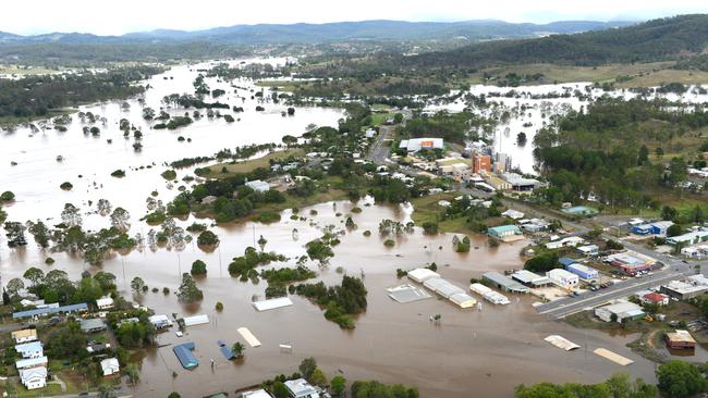 Looking down the river, Bruce Hwy businesses are under in the foreground with the Nestle coffee factory on the right. 2013 aerial flood pictures of Gympie. Photo Craig Warhurst / The Gympie Times