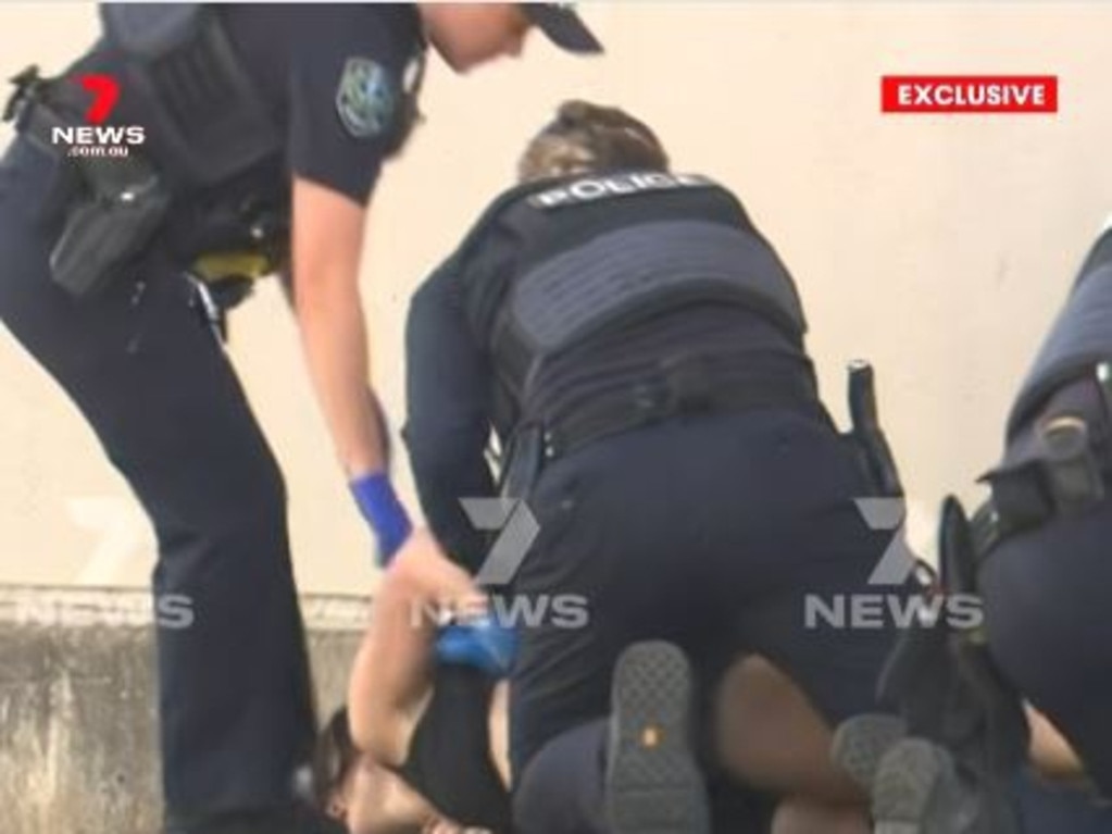 There has been a dramatic arrest at Kilkenny after a 31-year-old man was run over by a ute at a Hanson Road service station., The victim's friend, a 27-year-old Loxton woman, was arrested at the scene for disorderly behaviour. Picture: 7NEWS