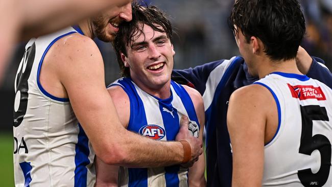 PERTH, AUSTRALIA - JUNE 08: George Wardlaw of the Kangaroos is happy with the win during the 2024 AFL Round 12 match between the West Coast Eagles and the North Melbourne Kangaroos at Optus Stadium on June 08, 2024 in Perth, Australia. (Photo by Daniel Carson/AFL Photos via Getty Images)