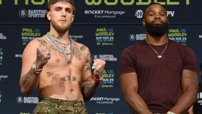 Big-talking Jake Paul and Tyron Woodley before the cameras during a Friday press conference.