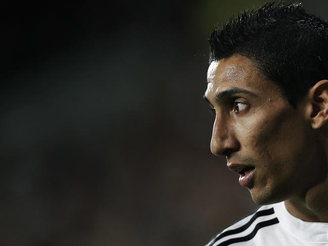 Real Madrid's Angel Di Maria from Argentina reacts during a Spanish Super Cup soccer match against Atletico Madrid at Santiago Bernabeu stadium in Madrid, Spain, Tuesday, Aug. 19, 2014 . (AP Photo/Daniel Ochoa de Olza)