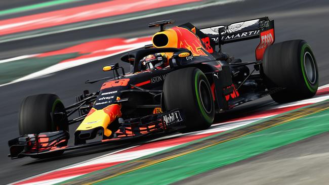 Max Verstappen driving the RB14 TAG at Circuit de Catalunya.