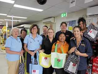 GOING GREEN: Condamine-Arubial QCWA members donate hand-crafted 'Boomerang Bags' to two Miles stores. Picture: Contributed