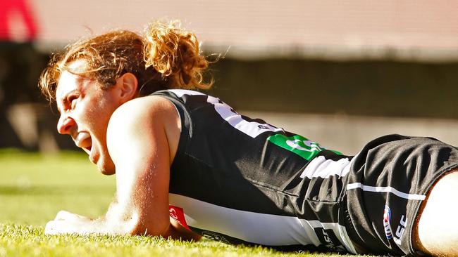 Tim Broomhead lies in pain on the ground. Picture: Getty Images