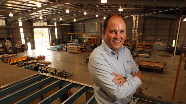 CEO of Canstruct Rory Murphy in one of his construction factories at Crestmead. He lived at Indooroopilly but moved to Tennyson.