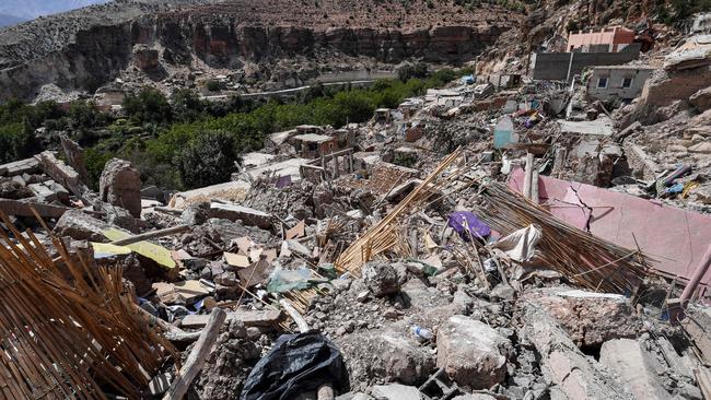 Destroyed houses in the earthquake-hit town of Afella. The disaster killed nearly 3,000 people and injured thousands more when it hit in Al-Haouz province. (Photo by FETHI BELAID / AFP)