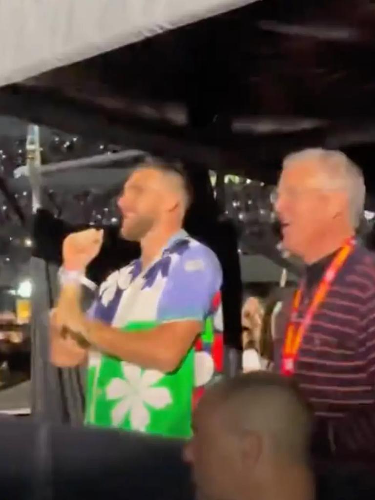 The athlete looked giddy while dancing with Taylor’s dad, Scott, in the VIP tent. Photo: tstourtips/Instagram.