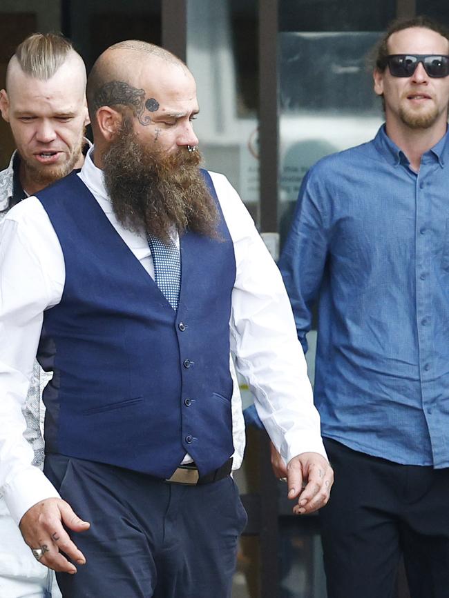 Brody Martin, Joshua McDonald and Jesse Martin leave the Cairns District Court after pleading guilty to Going in the with intent to intimidate and threatened to enter a dwelling and other offences. Picture: Brendan Radke